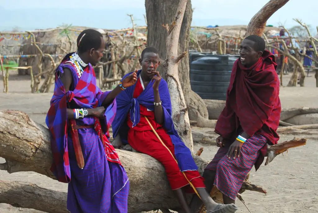 group of Maasai people in thir traditional costumes in Kenya