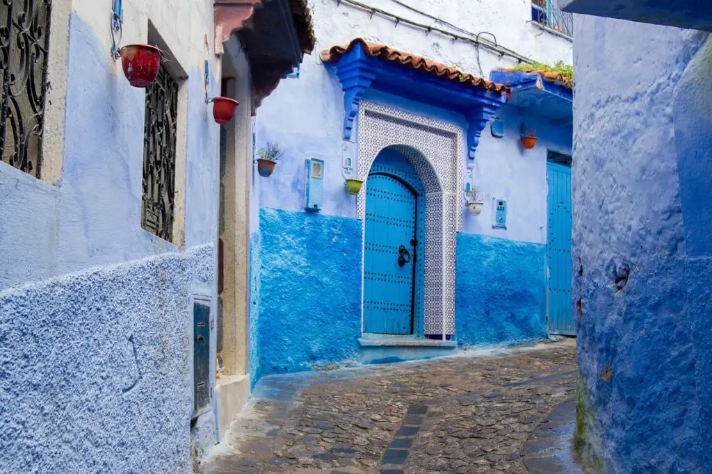  the azure streets of Chefchaouen, where each step is a brushstroke in the canvas of this surreal blue city
