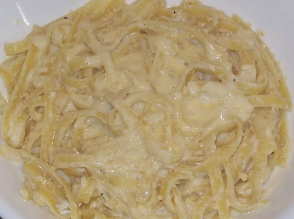  the creamy allure of Fettucine Alfredo. 