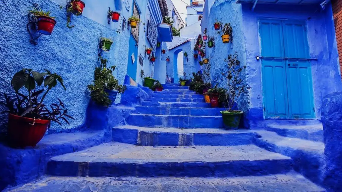 Chefchaouen's enchanting streets, where every corner unveils a canvas of vibrant blue hues.