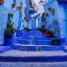Chefchaouen's enchanting streets, where every corner unveils a canvas of vibrant blue hues.