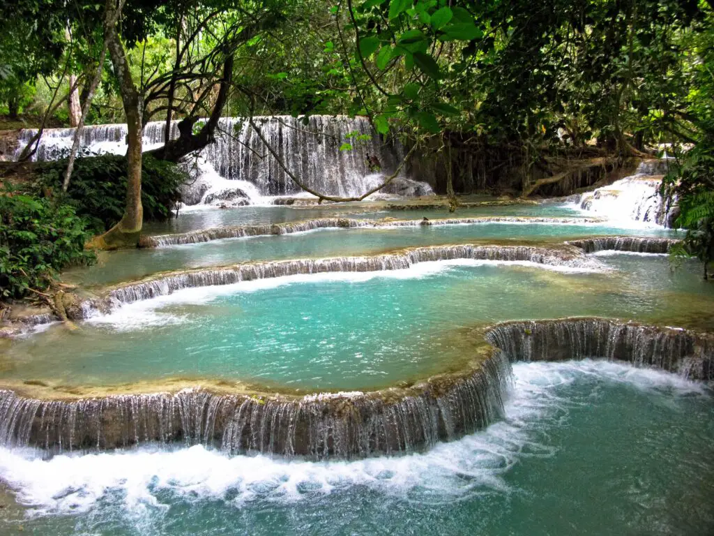  the tranquil vibes of Luang Prabang, where ancient temples whisper stories and the Mekong and Nam Khan rivers weave a serene melody.