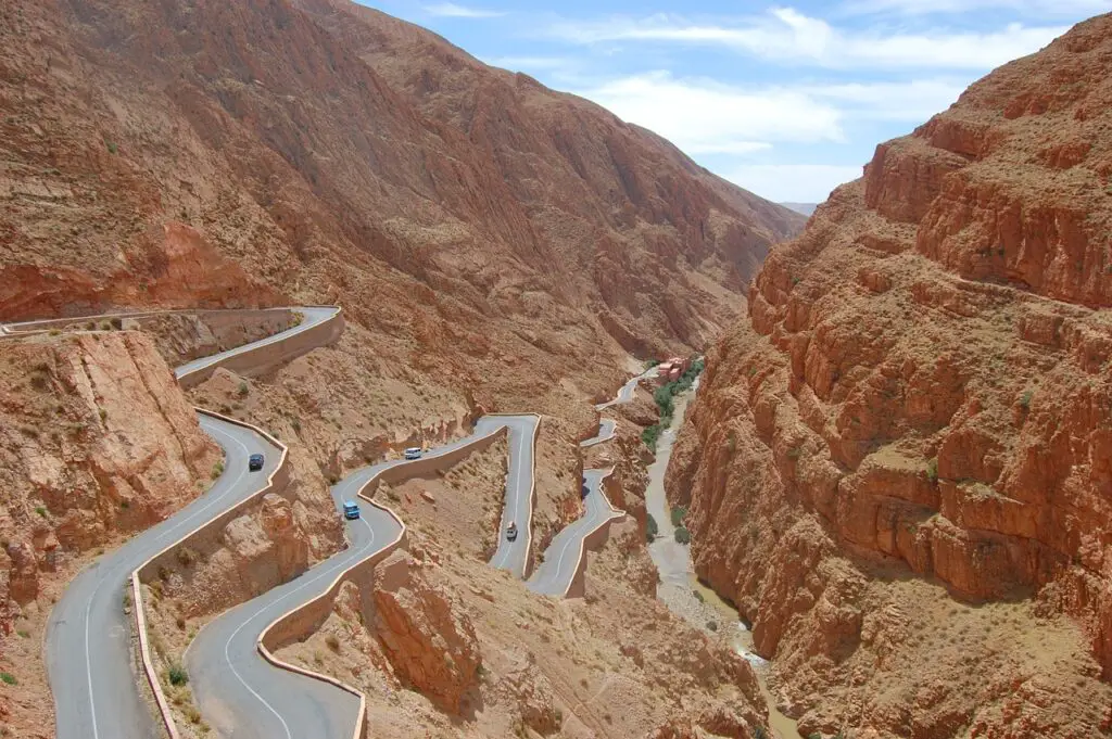 Each turn in the pass unveils the grandeur of the Atlas Mountains,
